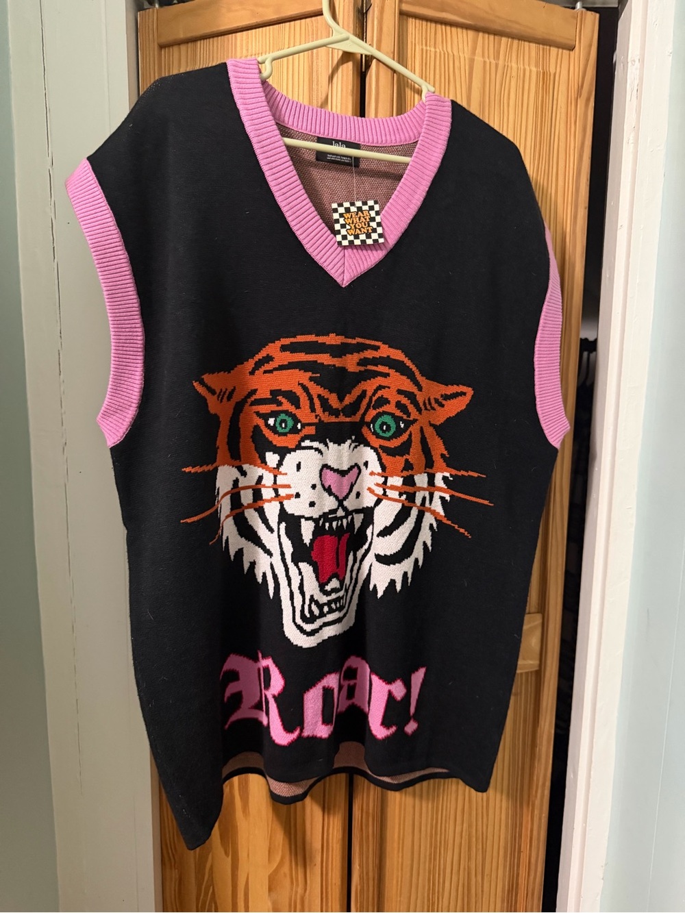 Dressed in LALA Black Knit Tiger Vest with Pink Trim